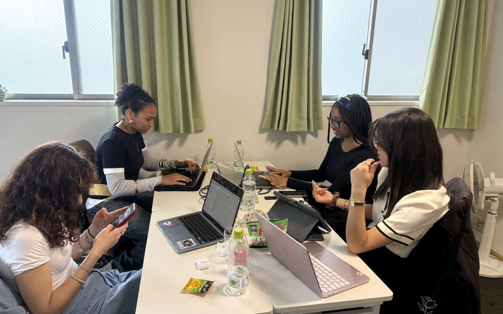 The Peace Works team working in Tokyo